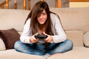 jeu vidéo femme lit console
