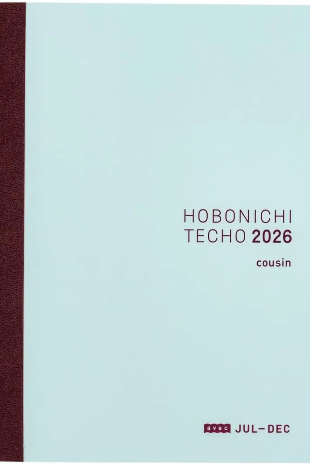 Diminuez la charge mentale - Couverture bleu pastel et tranche bordeaux de l'agenda Hobonichi Techo 2026 Cousin version Avec.