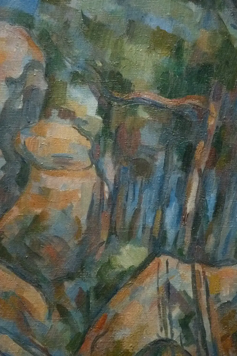 Les 3 expositions de la rentrée 2026 à Paris qui méritent vraiment une date dans votre agenda 2 Gros plan sur la texture de la matière picturale du tableau Rochers près des Grottes de Cézanne.